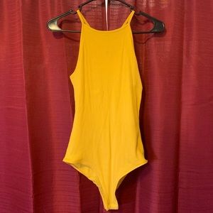 Yellow body suit